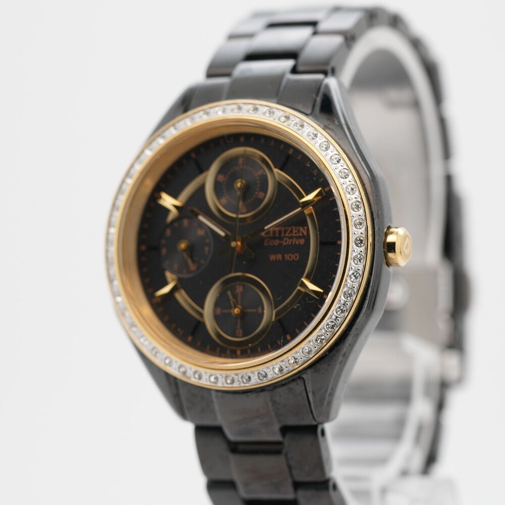 Citizen Eco-Drive 8637-S091080 Gold Tone Black Ceramic Watch 34mm WR100 Running